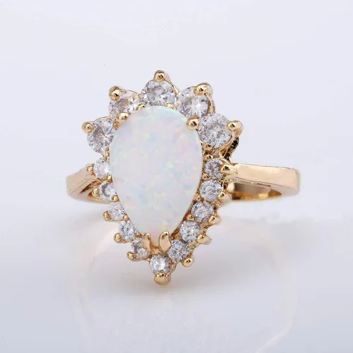Vista 7 de ZIS Nuevo diseño blanco ópalo de fuego gota de agua 18K chapado en oro CZ piedra anillos de compromiso (8)