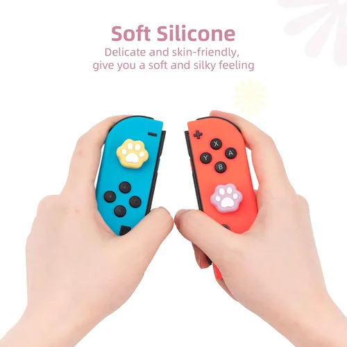 Vista 3 de GeekShare 4 tapas de agarre con forma de pata de gato, silicona suave, compatible con Nintendo SwitchOLEDSwitch Lite (amarillo y lila)