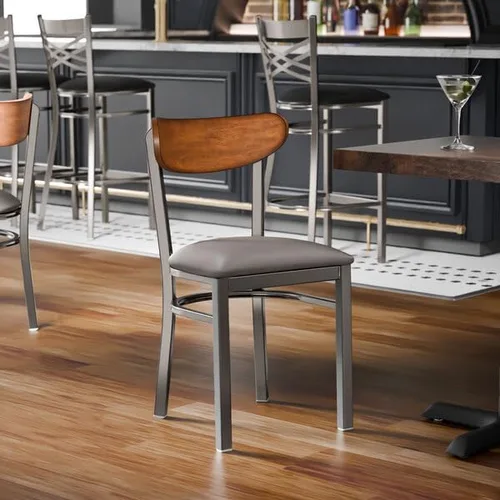 Vista 2 de Boomerang Mid-Century Dining Chair, Clear Coat Metal Frame, Dark Gray Vinyl Seat, Antique Walnut Wood Back, 32 Inch Height, Indoor Commercial Use