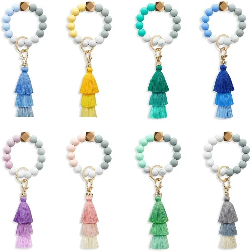 Vista 2 de Cynure Llavero para mujer con borlas y accesorios de silicona con cuentas