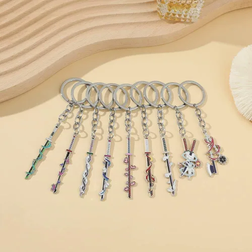 Vista 4 de YURAOER Juego de llaveros de anime Slayer Figuras de dibujos animados 9 Hashiras Mini Katana llaveros esmaltados para hombres y mujeres