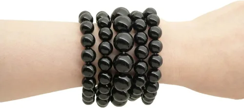 Vista 4 de Conjunto de 5 pulseras elásticas de perlas sintéticas para mujer