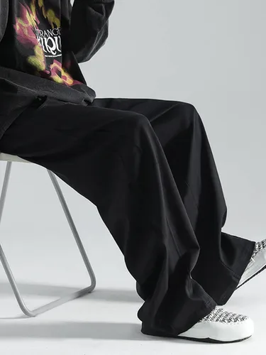 Vista 3 de OYOANGLE Pantalones deportivos holgados con cordón y cintura elástica Y2K para hombre, pantalones largos sueltos de pierna ancha con bolsillo