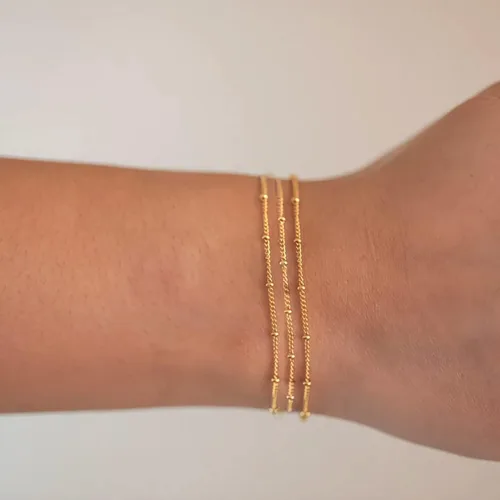 Vista 3 de Pulsera de cadena de elegante oro para mujer, pulseras de cadena individual o en capas, con eslabón de dije de corazón, karma, triángulo, perlas