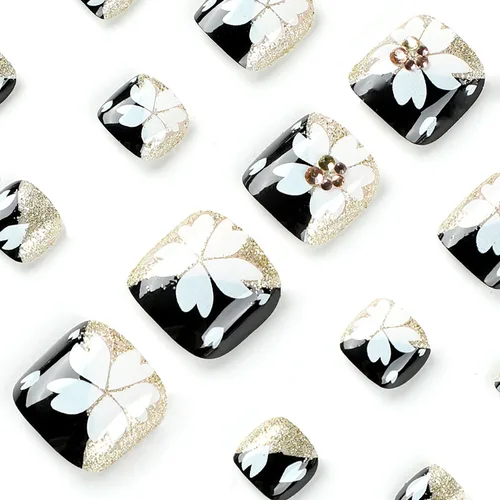 Vista 2 de Uñas postizas acrílicas artificiales negras para los dedos de los pies, ataúd a presión con diseños de flores blancas, uñas postizas reutilizables
