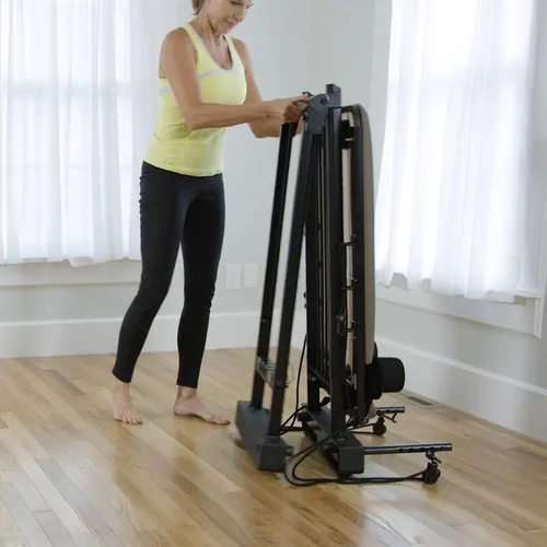 Vista 4 de Stamina Products AeroPilates Reformer 651 Máquina de entrenamiento de resistencia para todo el cuerpo para gimnasio en casa con soporte de 10