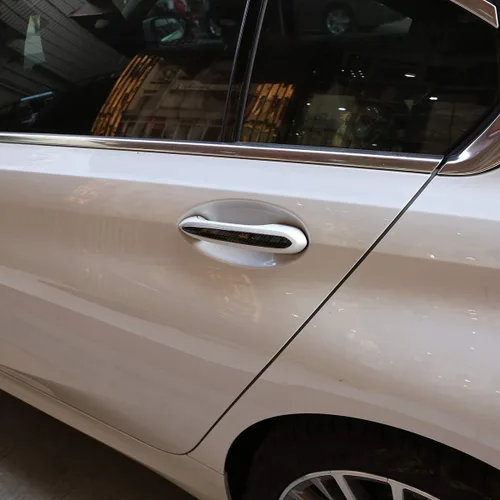 Vista 4 de YIWANG Tiras adhesivas para manija de puerta de automóvil estilo fibra de carbono, accesorios exteriores para BMW Serie 3 G20 G28 2019 2020,5 Series