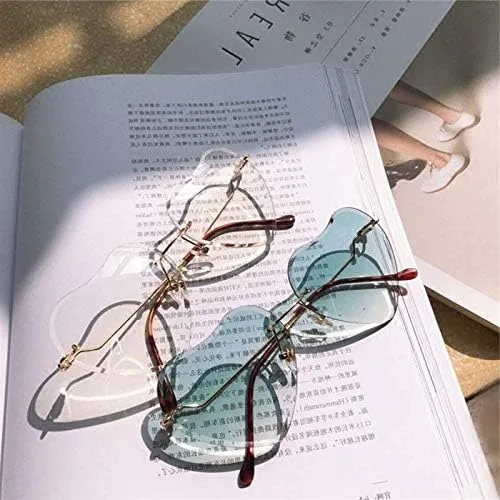 Vista 2 de Dollger Lentes de sol con forma de corazón para mujer sin montura de metal delgado con forma de corazón UV400 transparentes