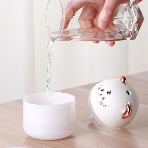 Vista 8 de Wakauto Mini humidificador USB con diseño de tigre de dibujos animados, humidificador de aire portátil para oficina, dormitorio, escritorio, luz