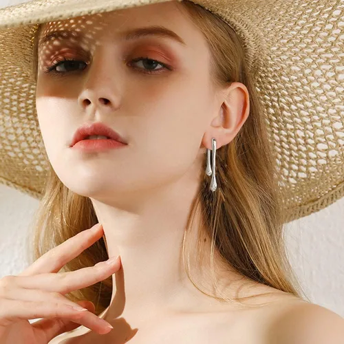 Vista 5 de Aretes colgantes minimalistas con forma de lágrima delantera y trasera para mujeres y niñas, diseño único, línea gruesa chapada en oro de 14