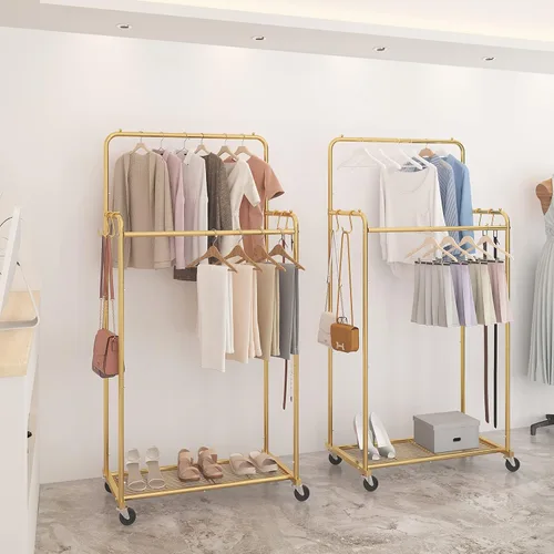 Vista 6 de Simple Trending - Perchero para ropa de doble varilla, estante resistente con ruedas para colgar ropa, con 4 ganchos, color dorado