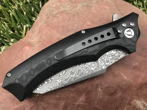 Vista 5 de TACTICAL GEARZ Cuchillo de bolsillo de acero de Damasco, cuchillo plegable EDC con mango G10, cuchillo de transporte diario de hoja de damasco de 67