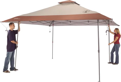 Vista 2 de Coleman 13x13ft Instant Canopy Sun Shelter Portable Shade Tent Sets Up in 3 Minutes Vented Roof for Airflow Great for Campsite Backyard Tailgates