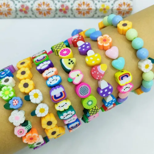 Vista 5 de 200 cuentas de arcilla polimérica de flores, cuentas espaciadoras de flores mixtas para hacer pulseras, collares, joyas