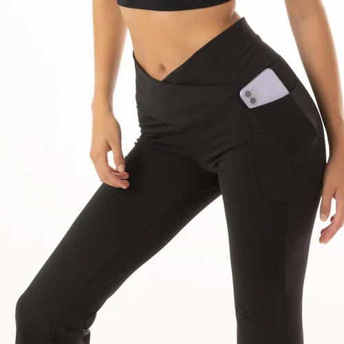 Vista 5 de Leggings acampanados para mujer, pantalones de yoga con bolsillos, para entrenamiento, corte cruzado, con control de abdomen, color negro