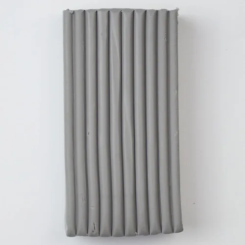 Vista 3 de Super Sculpey Gris Medio, Premium, No Tóxico, Firmeza Media, Arcilla Polimérica para Esculpir y Modelar, Arcilla para Hornear, Barra de 1 Libra.