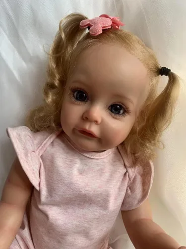 Vista 2 de Pinky Reborn Muñeca realista Reborn de 22 pulgadas, muñeca de silicona de cuerpo completo recién nacido, muñeca de bebé recién nacido, de aspecto