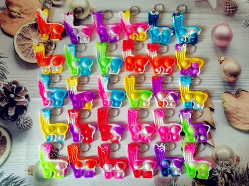 Vista 2 de Bluk - Pequeños juguetes sensoriales antiestrés con diseño de arco iris, miniherramientas sensoriales con burbujas emergentes simples, colgantes