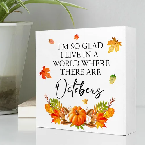 Vista 3 de Decoración de mesa de otoño, con texto en inglés "I'm so Glad I Live in a World Where There are Octobers", letrero de madera rústica, hojas