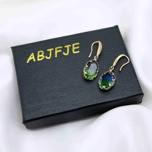 Vista 7 de Aretes colgantes de piedra preciosa de turmalina azul simple, aretes colgantes clásicos de oro brillante con circonita de cristal ovalado, joyería