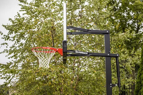 Vista 9 de Silverback Aro de baloncesto de altura ajustable en el suelo con tablero de vidrio templado, borde de separación profesional y almohadilla de tablero
