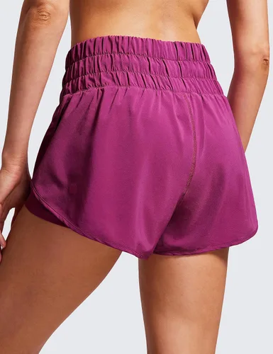 Vista 2 de CRZ YOGA - Pantalones cortos de correr 2 en 1 divididos para mujer de 3 pulgadas - Pantalones cortos de entrenamiento atlético de cintura alta