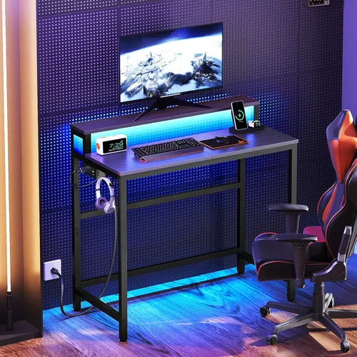 Vista 2 de YATINEY Escritorio pequeño para computadora con estación de carga y luces LED, escritorio para juegos con soporte para monitor, escritorio