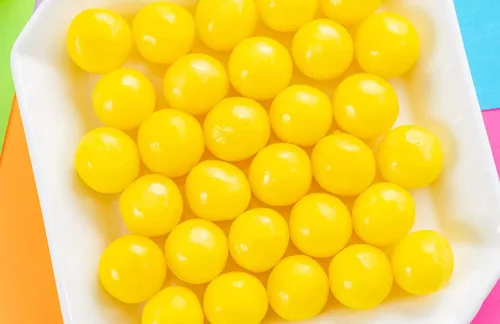 Vista 2 de SweetGourmet Caramelo original LemonHead envuelto a granel 1 libra