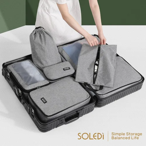 Vista 8 de SOLEDI Juego de 7 cubos de compresión para artículos esenciales de viaje, bolsas organizadoras de equipaje, incluye organizador de cables, bolsa