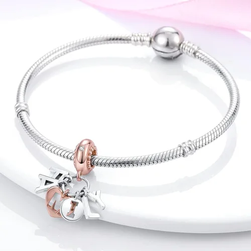 Vista 2 de MULA - Dijes para colocar en pulseras y collares en varios motivos de aviones viajes flores hermanas mariposas delfines tortugas regalo de joyería