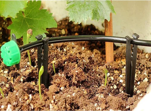 Vista 5 de XYSMZM 60 estacas de riego por goteo para tubos de goteo de 1/8 pulgadas y 1/4 pulgadas para cultivo hidropónico de jardín
