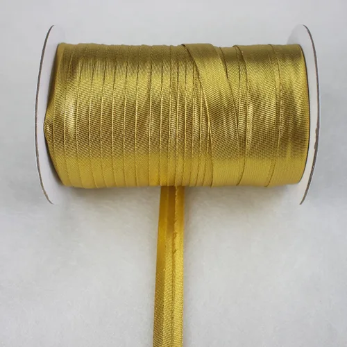 Vista 6 de Cinta de bies metálica de 0.591 in de un solo pliegue para coser 100% poliéster color sólido (dorado)