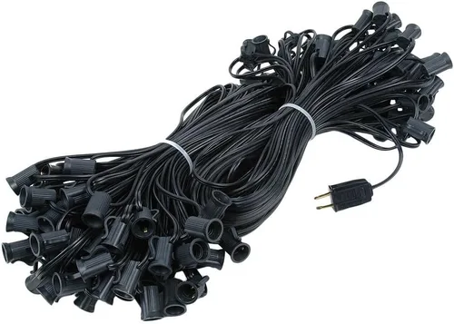 Vista 10 de Novelty Lights Cadena de luces de Navidad C7 de 100 pies para exteriores, tira de luces para patio, base de candelabro (C7/E12), espacio de 12 Blanco