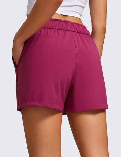 Vista 2 de CRZ YOGA Pantalones cortos deportivos elásticos en 4 direcciones para mujer, de cintura alta, cómodos pantalones cortos casuales de trabajo