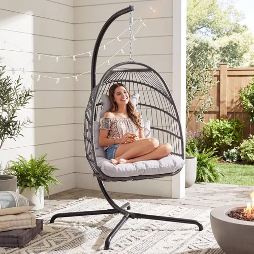 Vista 2 de NICESOUL Cómoda y cómoda silla de mimbre para exteriores con soporte, sillas plegables para patio con cojín, hamaca resistente de 350 libras