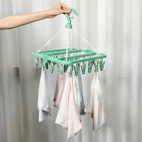 Vista 7 de Percha para secar ropa con 32 pinzas y percha plegable para colgar (Verde Claro)
