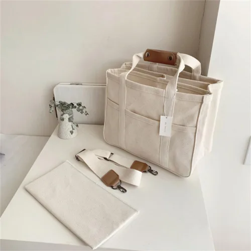 Vista 2 de Bolsa de lona con múltiples bolsillos para mujer, bolsa cruzada duradera de gran capacidad, bolsa de hombro práctica casual con compartimentos