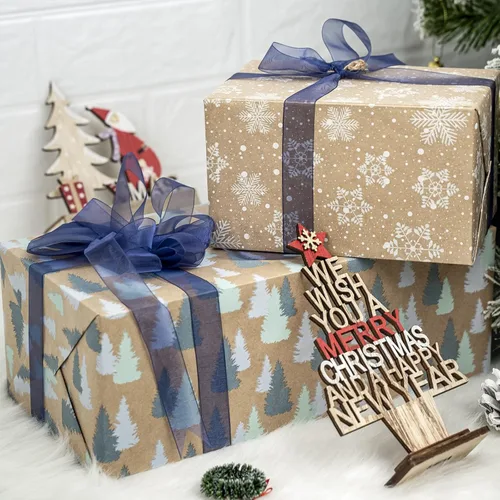 Vista 8 de RUSPEPA Papel de regalo de Navidad, papel kraft – reno, rayas y copos de nieve en diseño azul – 4 rollos – 30 pulgadas x 10 pies por rollo