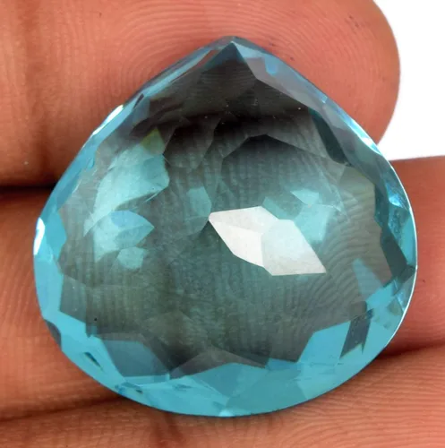 Vista 3 de GEMHUB Topacio azul de aproximadamente 70.00 a 80.00 ct en forma de pera topacio creado en laboratorio para la fabricación de joyas, Gema, Brasilia