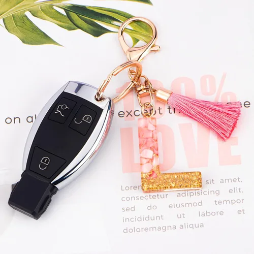 Vista 3 de Suweibuke Lindos llaveros rosados para mujeres y niñas, llaveros de letra inicial con borla, dijes para llaves, bolsos, mochilas