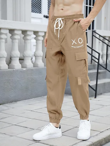 Vista 4 de OYOANGLE Pantalones cargo con cordón elástico en la cintura y bolsillo con solapa para hombre