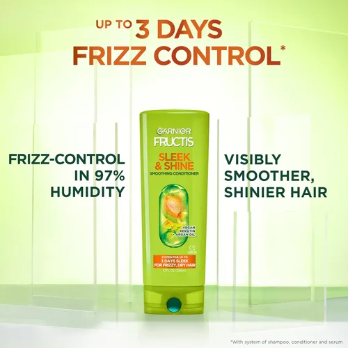 Vista 3 de Acondicionador Garnier Fructis Sleek & Shine, cabello rizado, seco, inmanejable, 21 fl. oz. (El empaque puede variar)