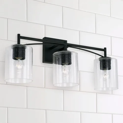 Vista 2 de Capital Lighting Peyton 142031MB-510 - Soporte de pared para tocador de baño de vidrio transparente industrial, 3 luces, 300 vatios en total, 10