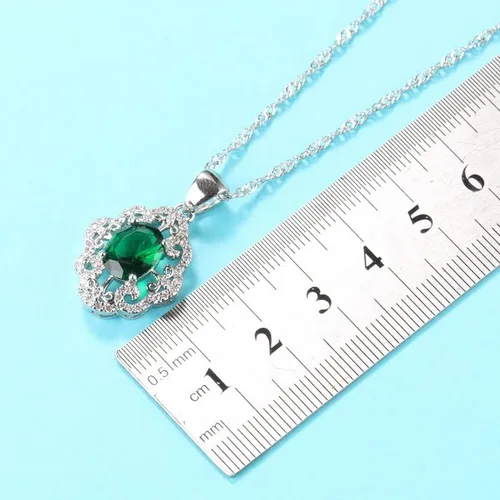 Vista 4 de Juego de joyas de plata de ley 925 para boda, aretes de circón verde, collar, pulsera y anillo para mujer