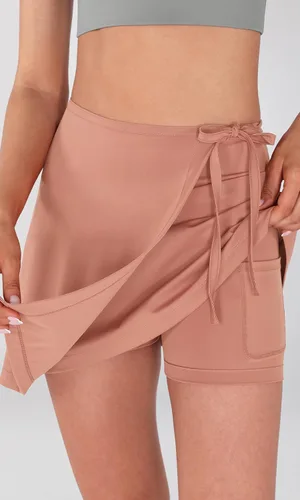 Vista 2 de ODODOS Falda pantalón envolvente para mujer, pantalones cortos integrados, faldas de tenis de cintura alta con bolsillos para golf atlético casual