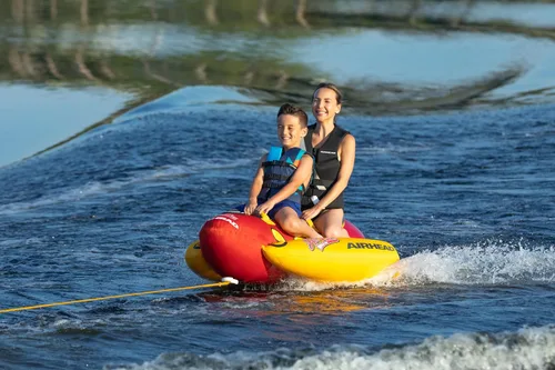 Vista 5 de Airhead Hot Dog Towable Tube for Boating, 1-5 Rider Inflatable Boat Tube for Water Tubing, Full Nylon Cover, EVA Padding, Foam Padded Handles