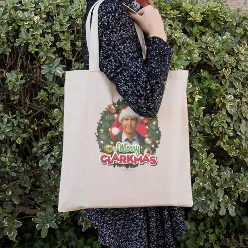 Vista 3 de GRAPHICS & MORE Bolsa reutilizable de viaje con texto en inglés «Merry Clarkmas» de Navidad, Multi