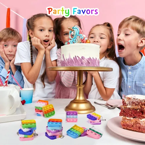 Vista 4 de Regalos de fiesta de dinosaurios, llaveros de dinosaurio para niños, recuerdos de fiesta, juguetes fidget a granel, paquete de 30 mini llaveros