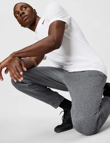 Vista 4 de Nike Therma-Fit - Pantalones de entrenamiento ajustados para hombre
