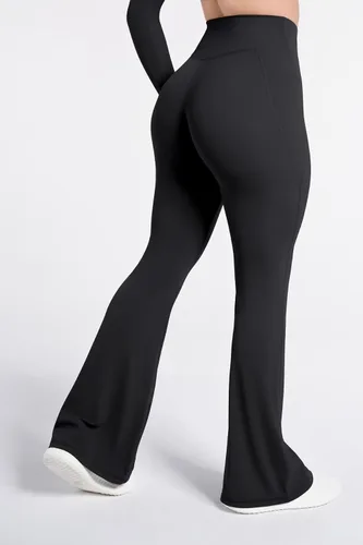 Vista 3 de Sunzel Leggings acampanados, pantalones deportivos y cruzados para yoga, con control de abdomen, cintura alta y piernas anchas